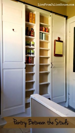 This pantry was made by using the space in between the wall stud in her kitchen. Love the barnyard doors!