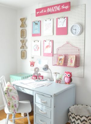 Install a pegboard behind your girl's computer desk for additional storage space.